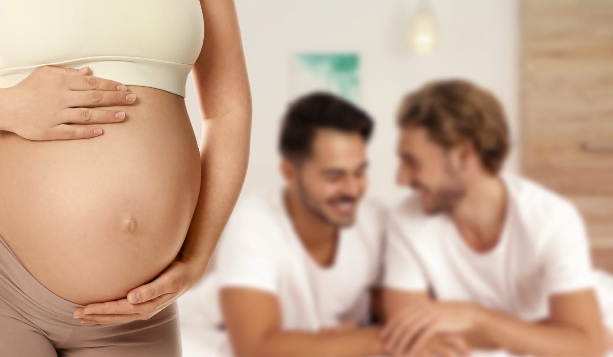 Surrogacy,Concept.,Young,Pregnant,Woman,And,Blurred,View,Of,Happy